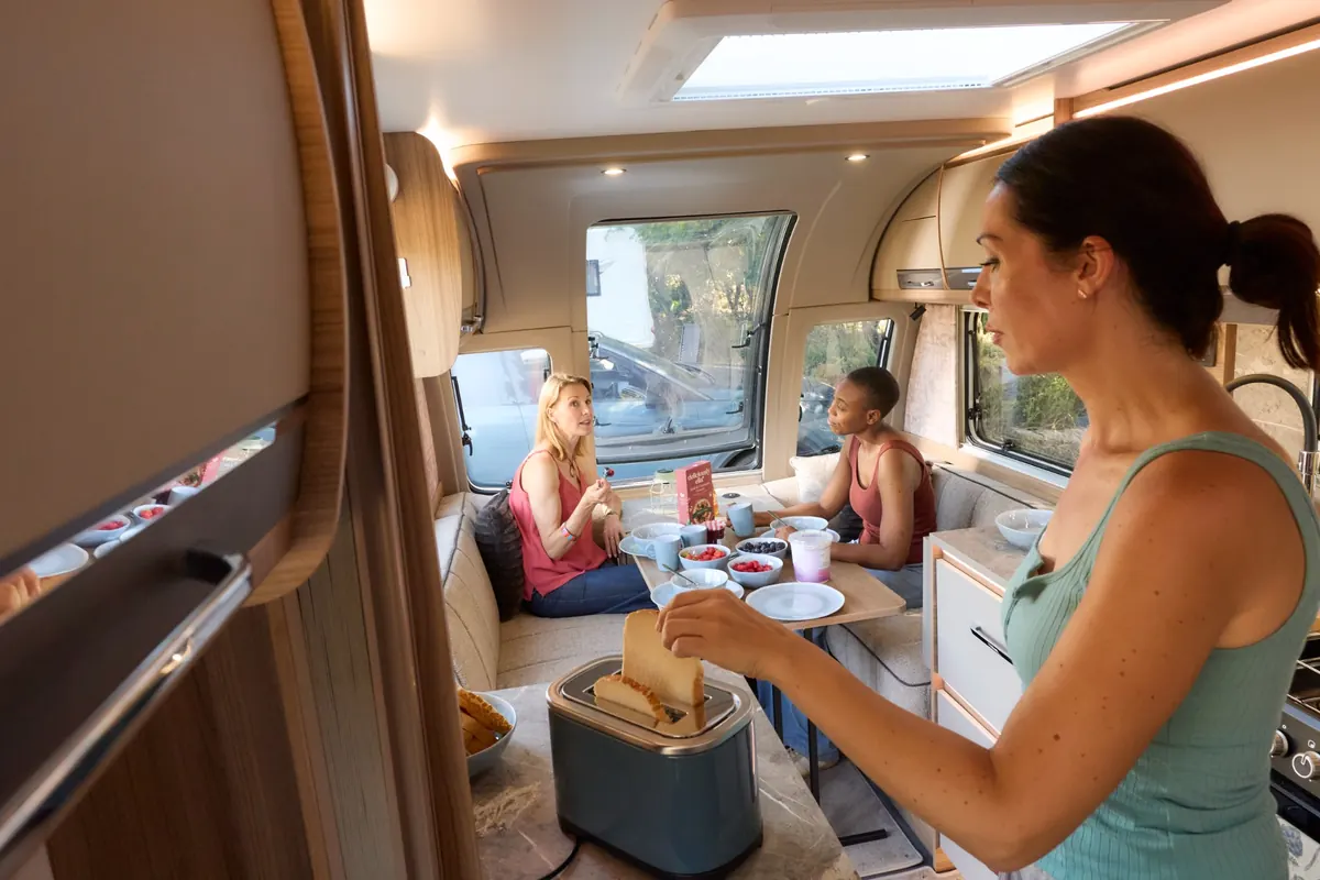 Getting ready for the day inside a Bailey Unicorn Lite caravan